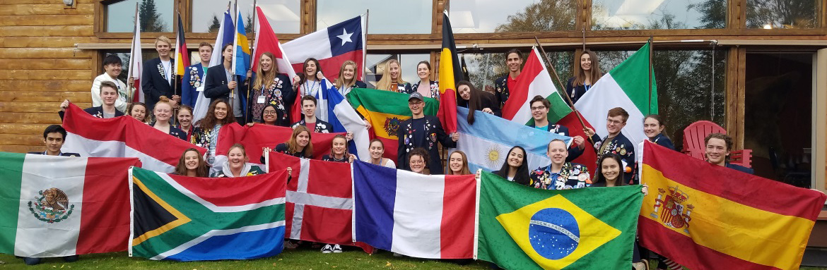 Rotary Youth Exchange Students with their flags